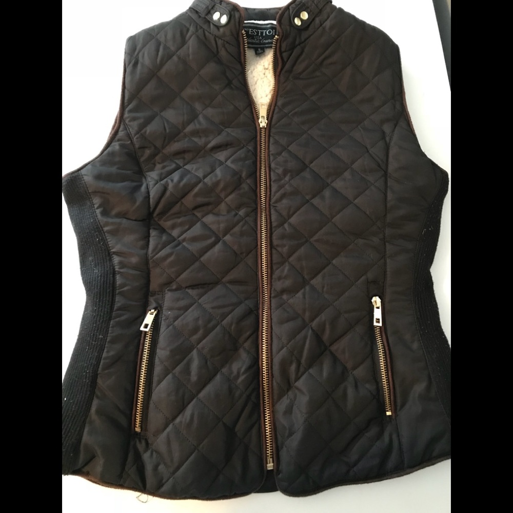 Black vest with gold zippers